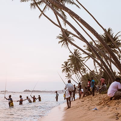 Fishermen on beach in Sri Lanka