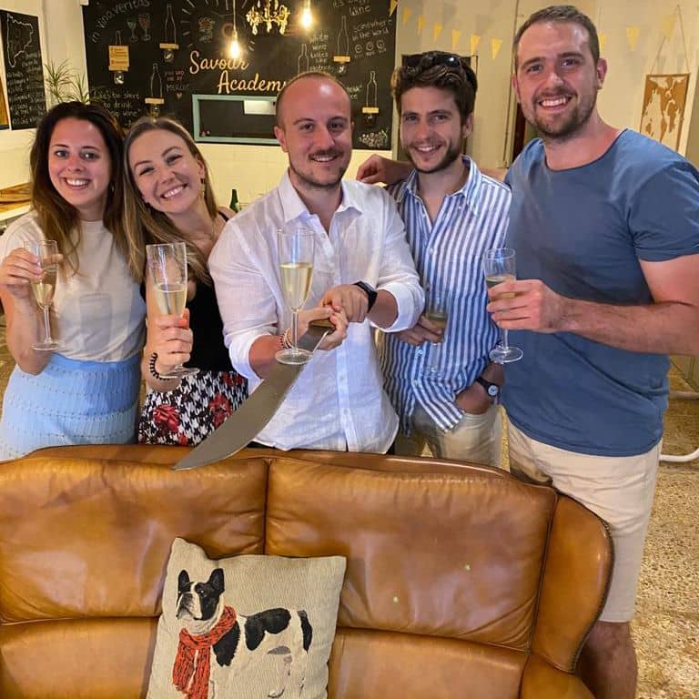 s-7-additional-info-cava-sabrage-barcelona-at-savour-academy-food-and-wine-events girl receiving sabrage certificate